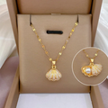 Pearl & Shell Motif Locket Set – Gold Stainless Steel