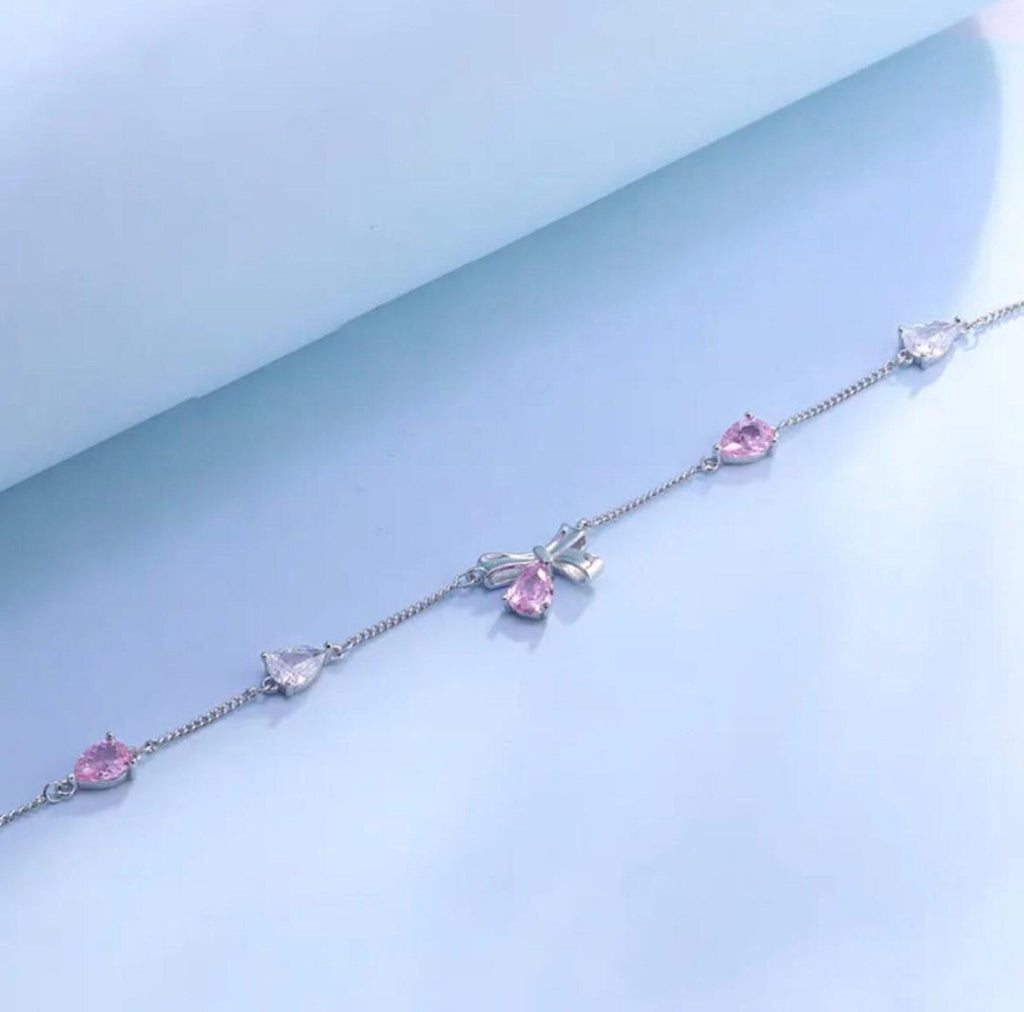 Flowra silver bow crystal charm pink white teardrop.